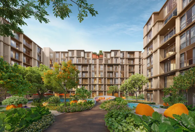 CANVAZ Palette Cherngtalay — courtyard with the pool between the two buildings
